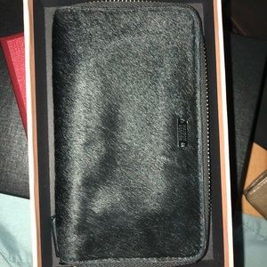 Black faux fur wallet